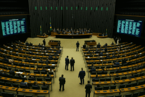 Imagem gerada por Inteligência Artificial mostra o plenário da Câmara dos Deputados, em Brasília, durante uma sessão de votação parlamentar.