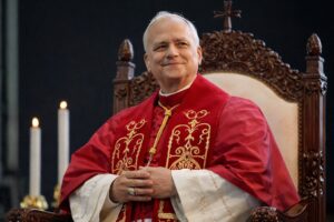 Imagem gerada por inteligência artificial retratando o Papa Leão, atual pontífice da Igreja Católica, vestido com trajes papais tradicionais, em ambiente solene no Vaticano.
